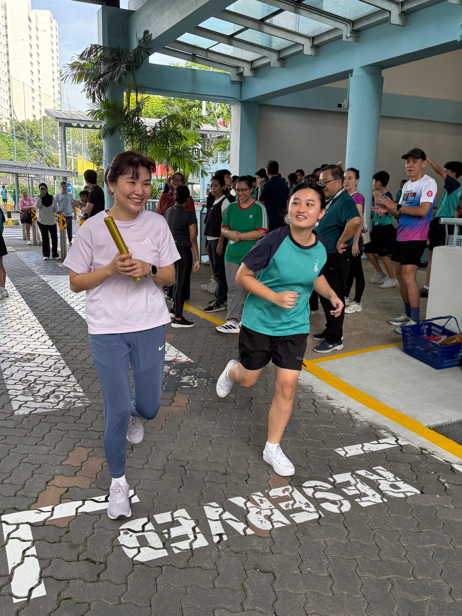 a girl races with her mum